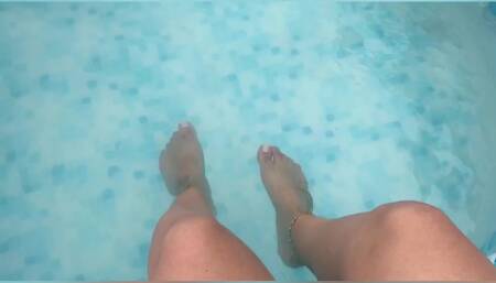Feet on the pool - POV