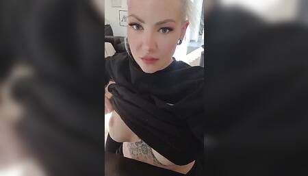 Blonde playing with her boobies