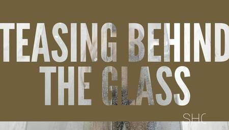 Behind the glass