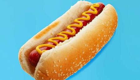 Eating two hotdogs