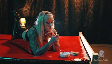 Smoking on the red pvc bed 4K MP4