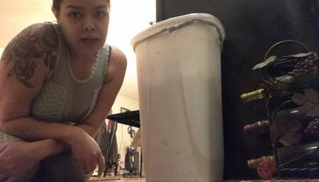 Tiny man accidentally falls into trash can