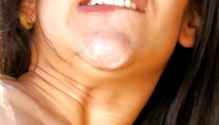 Fingering her tight pussy on the beach makes the busty