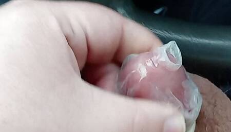 A little car play jerking off 8n a condom