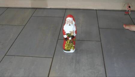 Santa under Christins feet
