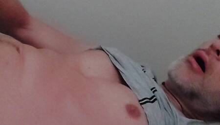 Jerking off a bit with the morning wood to prepare for the cumshot in the evening