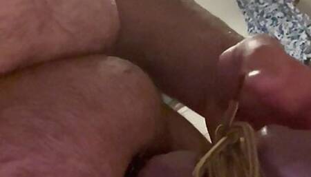 Nipple piercing with safety pins with cock bound