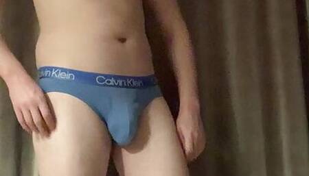 Young guy undresses and shows body
