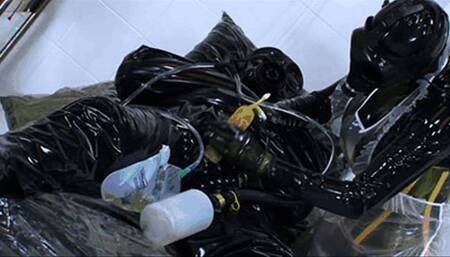 Black latex mistress and her piss breathing and catheter session with rubber slave - Part 1 of 2