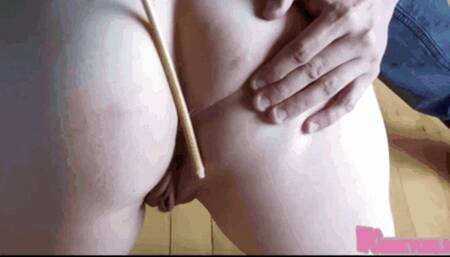Young ass gets hard caning with stick