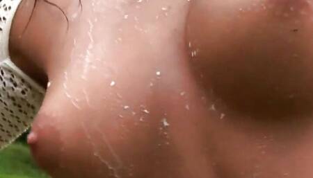 Hot Brunette pour some milk on her rounded tits and tease