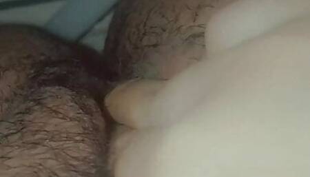 Horny girl fucks her hairy pussy and moans loudly