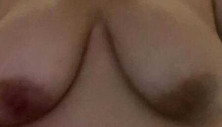 Rubbing cream on tits