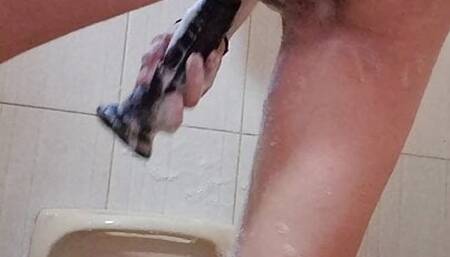 Double penetrating masturbating in shower and squirting
