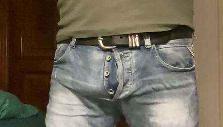 Putting my belt on my jeans