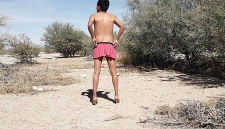 cute tranny in miniskirt and very hot high heels strips naked in public