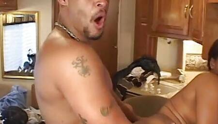 Two hard cock hunks are fucking a black and a white slut side by side