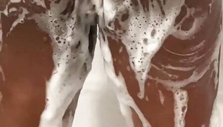 Candy Rose in the shower getting soapy