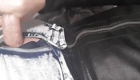 Gay edging in biker leather gear