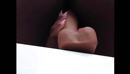 Black Babe Rides Dildo on Tub