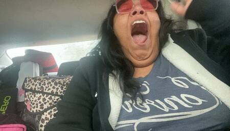 Yawning on rainy road trip