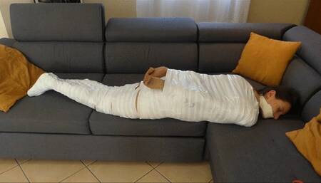 Chloe mummification in white tape
