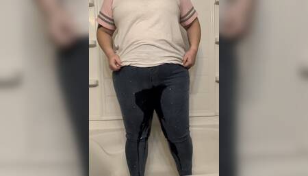 Sexy girl struggles to hold her full bladder
