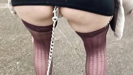 Lady Oups whore buttplug in leash public in park micro skirt
