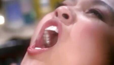 Asian beauty wraps her lips around a massive white cock then gets drilled
