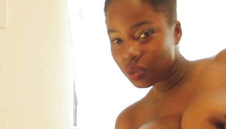 Sexy big tit ebony babe Melanie strip down and plays with her pussy