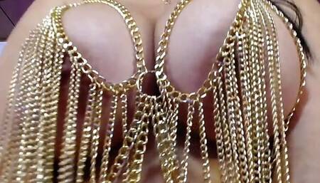 Sexy goddess plays with her big tits in chains outfit fuck big tits and sucks her nipples with a lot of pleasure