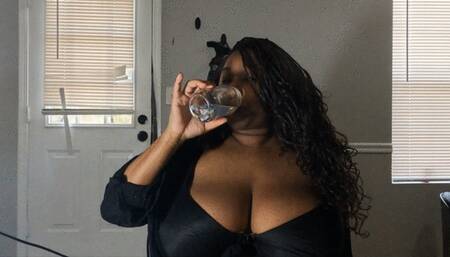Giantess Enjoying her Favorite Drink