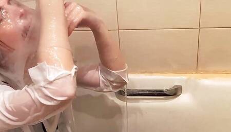Tina Tackle enjoying some lotion play in a japanese school swimsuit