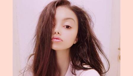 \nSissi Masturbates Her Tight Pussy on the Couch