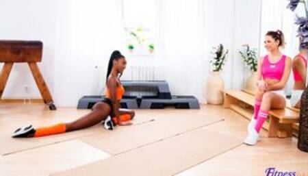 Interracial lesbian 69 in the gym