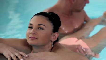 Juicy girl is fucked in the pool by a kinky fitness instructor