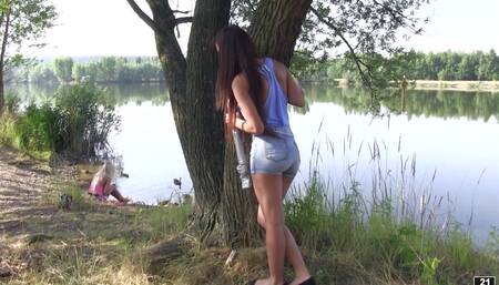 Lovely dolls make lesbian love in their secret place in the park