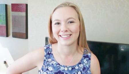 Smiling babe with a large ass is handling a cock