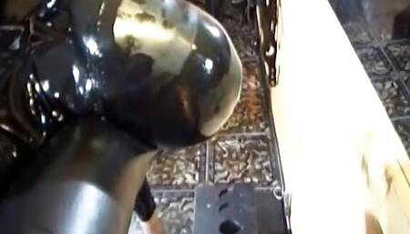 BDSM hardcore on the latex swing