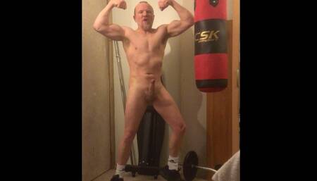 Aggressive verbal muscular bodybuilder boxer with huge boner gets pumped up and turned on punching boxing sack
