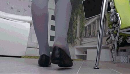 long day at work in tight black flats back view d