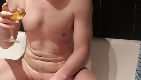 Sissy plays with her own piss