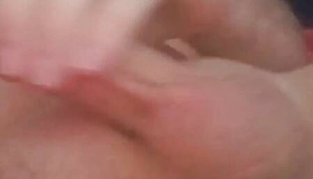 Chilled out in bed in the evening playing with cock and balls.