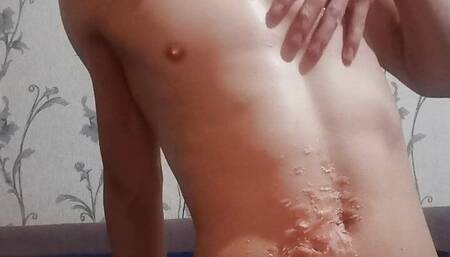 Boy plays with hard dick and candle. Drips on itself with wax