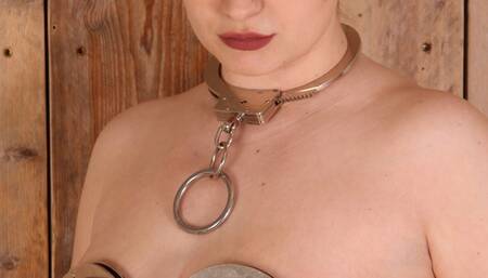 Clara boob cuffed to the wall