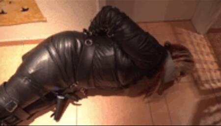 Helpless in Leather Outfit and Leather Hood
