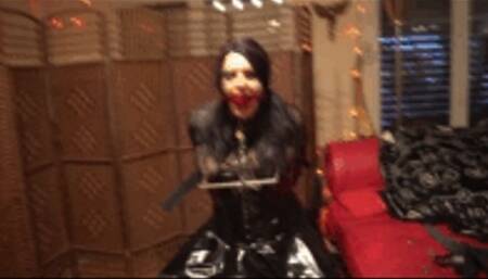 Gothic women punished with a nipple stretch device