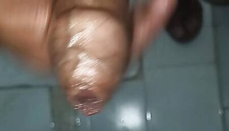 Indian middle age man massage his pennis with oil and gel