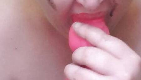 Slut gags on dildo