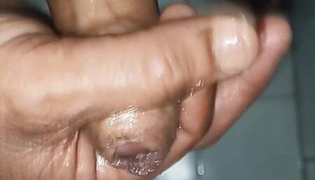 Indian middle age man massage his pennis with oil and gel